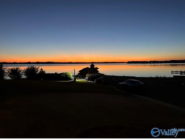 property view of water featuring a dock