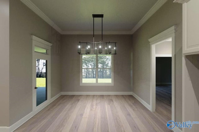 unfurnished dining area with ornamental molding, a healthy amount of sunlight, light wood-style floors, and baseboards