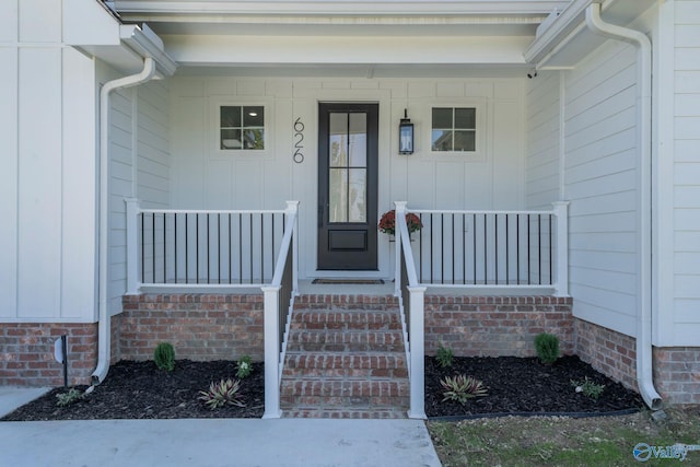 entrance to property with covered porch