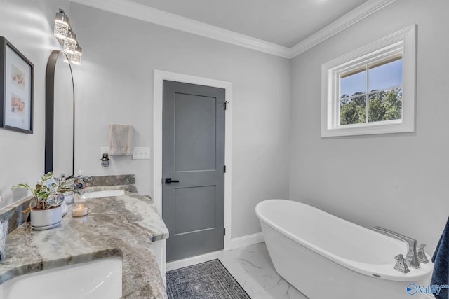 bathroom with vanity, a tub to relax in, and crown molding