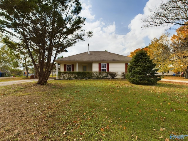 ranch-style home with a front yard