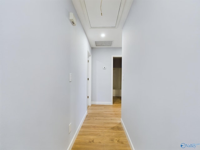 hall featuring light hardwood / wood-style floors