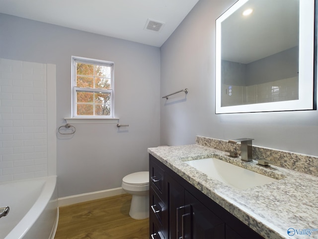 full bathroom with toilet, vanity, shower / bath combination, and hardwood / wood-style flooring