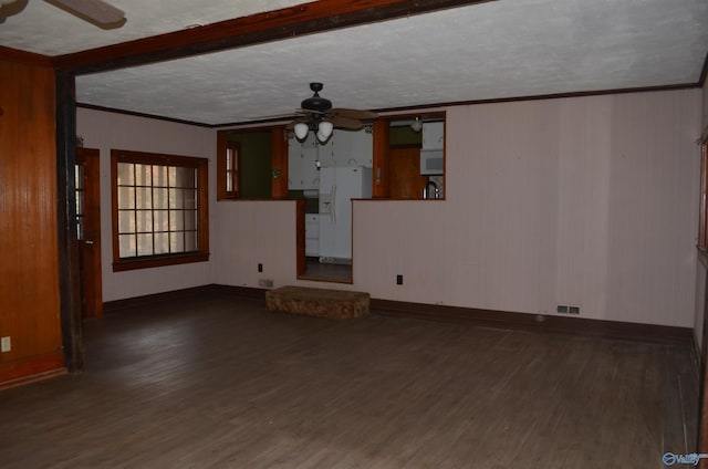 unfurnished living room featuring a textured ceiling, crown molding, wood finished floors, and a ceiling fan