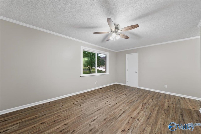 unfurnished room featuring a textured ceiling, crown molding, and dark hardwood / wood-style floors