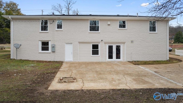 back of house featuring french doors and a patio