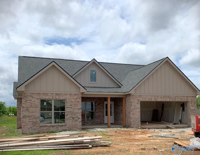92 Broadhead Dr, Decatur, AL 35603 - view of front of property featuring brick siding, a shingled roof, and a garage