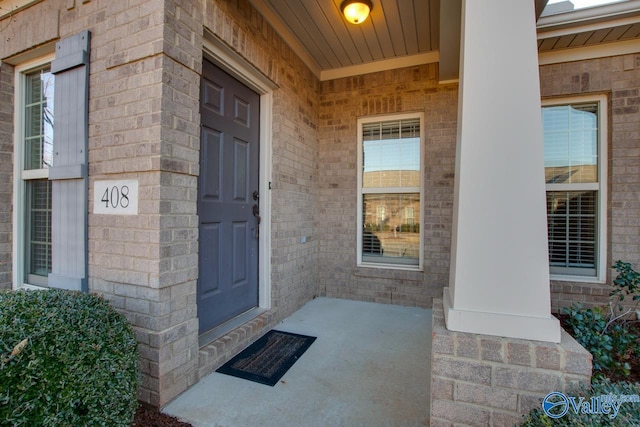 property entrance featuring covered porch