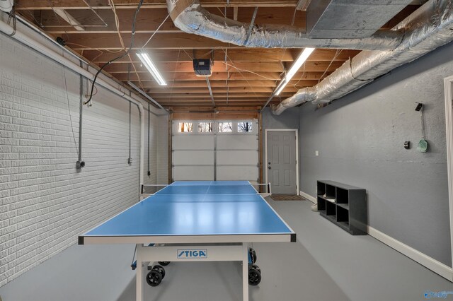 game room with concrete flooring