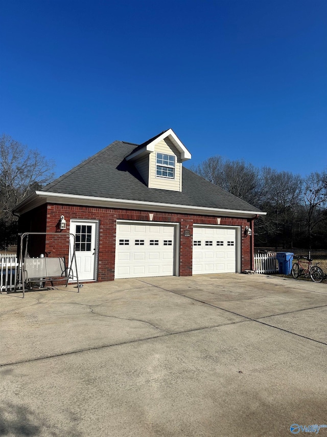 view of home's exterior with a garage