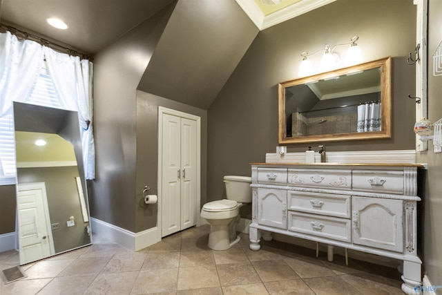 full bathroom featuring toilet, vanity, ornamental molding, tile patterned flooring, and baseboards