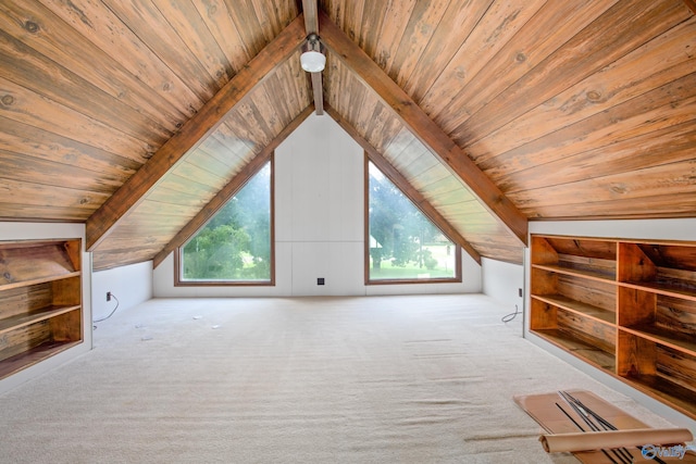 bonus room featuring light colored carpet, lofted ceiling with beams, plenty of natural light, and wood ceiling