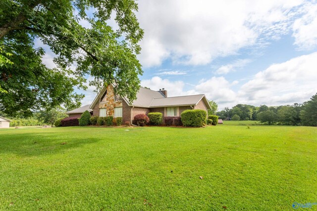 exterior space with a front lawn