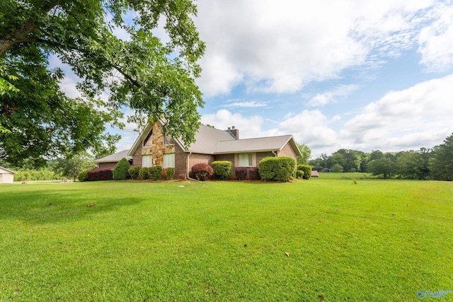 view of front of home with a front lawn