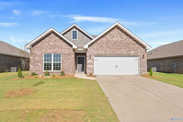 view of front facade featuring a garage, central AC, and a front lawn