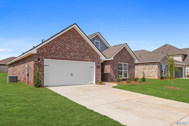 view of front of home with central AC, a garage, and a front yard