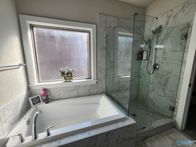 bathroom with independent shower and bath