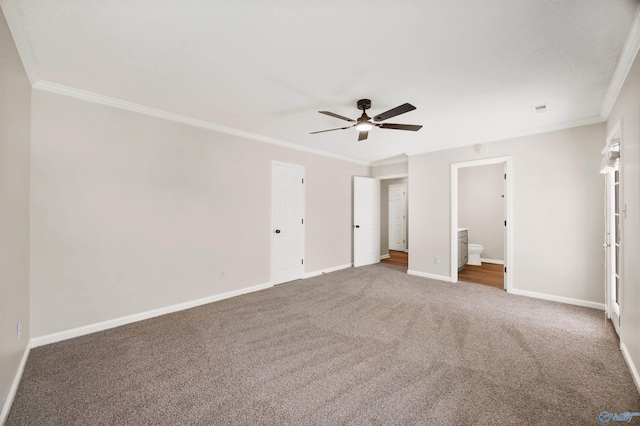 1417 Smith Ave SW, Decatur, AL 35603 - unfurnished bedroom with crown molding, baseboards, carpet, ensuite bathroom, and a ceiling fan