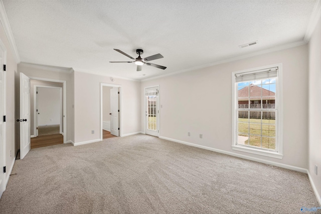 1417 Smith Ave SW, Decatur, AL 35603 - unfurnished bedroom featuring carpet flooring, ornamental molding, baseboards, and a ceiling fan