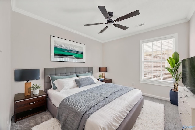 1417 Smith Ave SW, Decatur, AL 35603 - carpeted bedroom featuring crown molding, baseboards, and ceiling fan