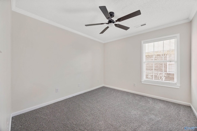 1417 Smith Ave SW, Decatur, AL 35603 - carpeted empty room with ornamental molding, baseboards, and a ceiling fan
