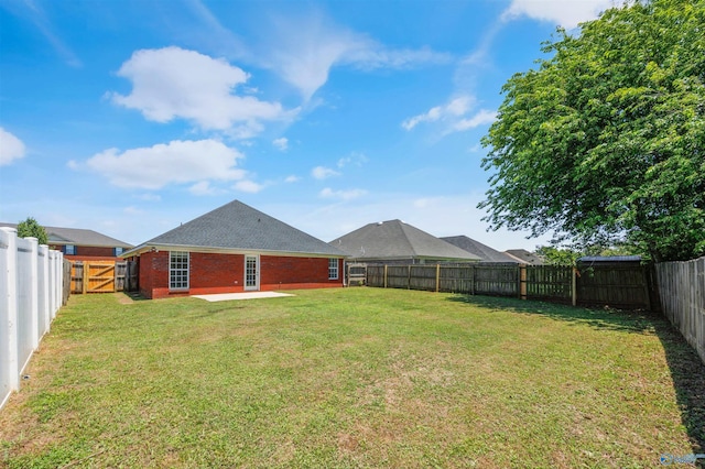 1417 Smith Ave SW, Decatur, AL 35603 - view of yard featuring a patio area