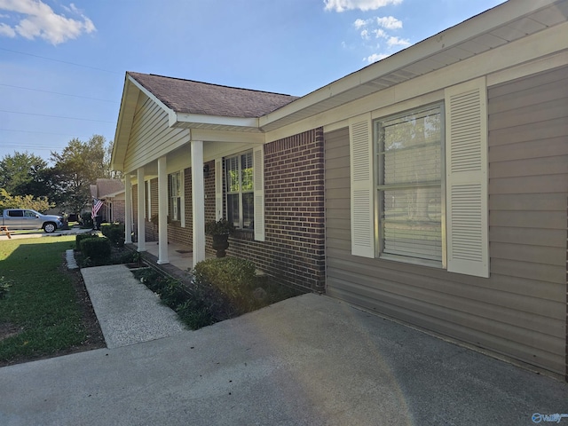 view of home's exterior with a porch