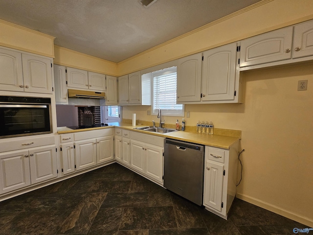 kitchen with sink, black appliances, and white cabinets