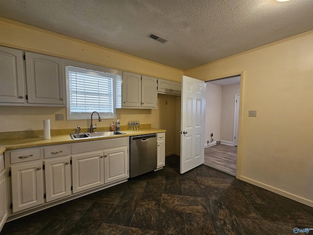 kitchen featuring white cabinetry, dishwasher, and sink