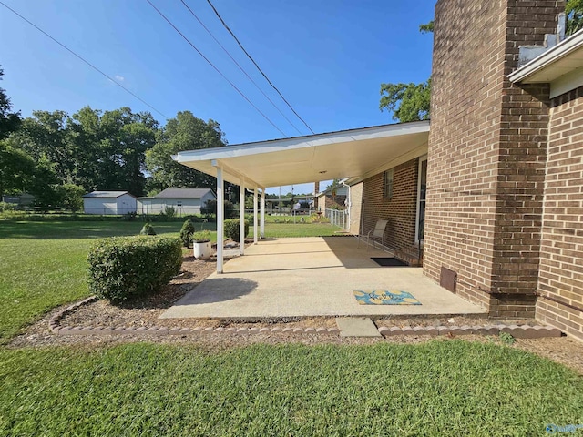 view of patio featuring a carport