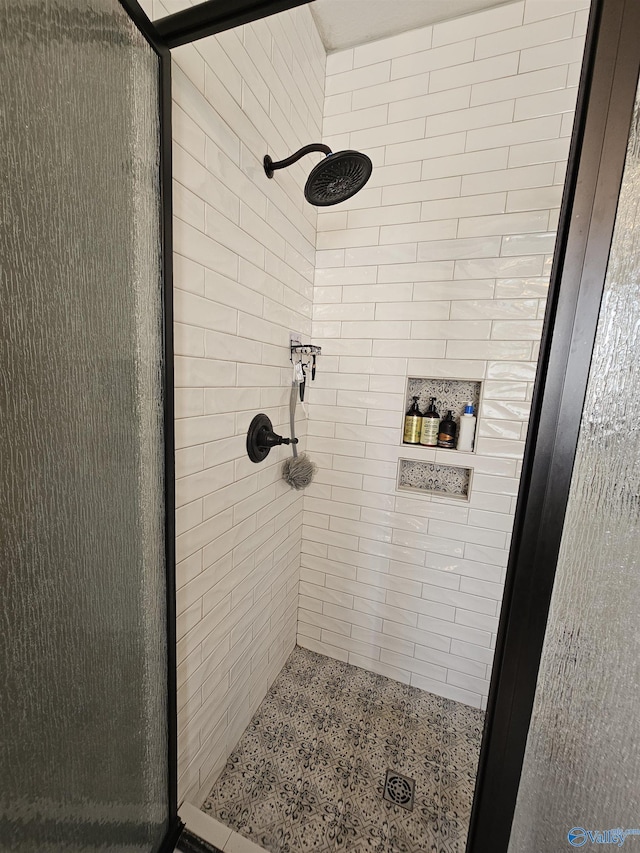 full bathroom featuring a shower stall