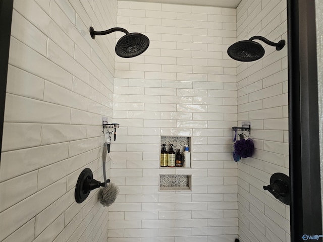 full bath with tiled shower