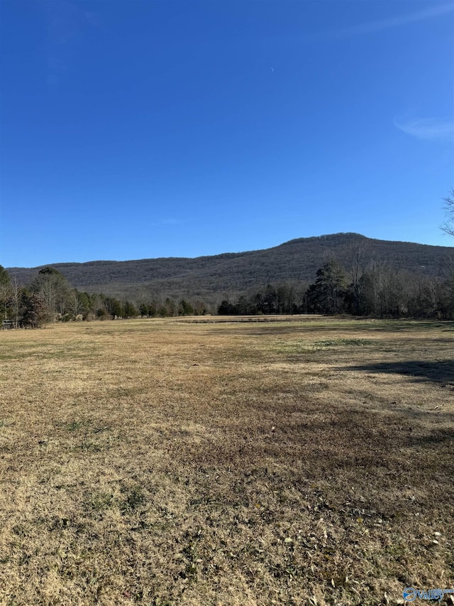 view of mountain background with rural landscape