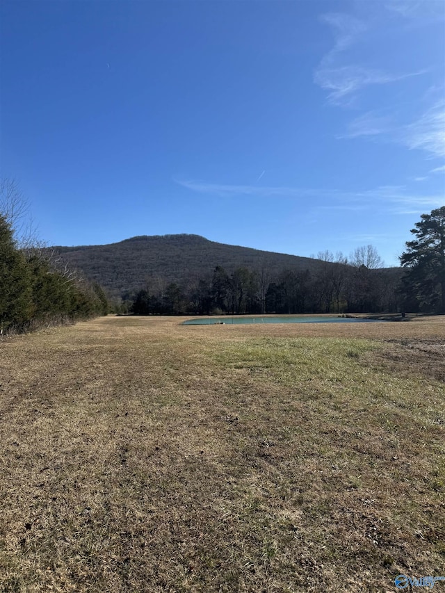 view of mountain background with rural landscape