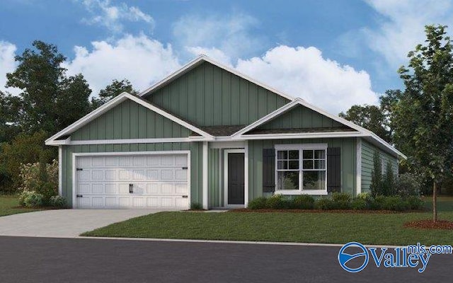 view of front of house with a front lawn and a garage