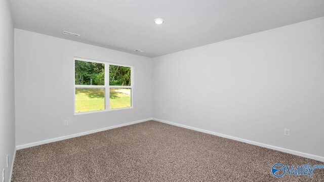 unfurnished room featuring carpet floors