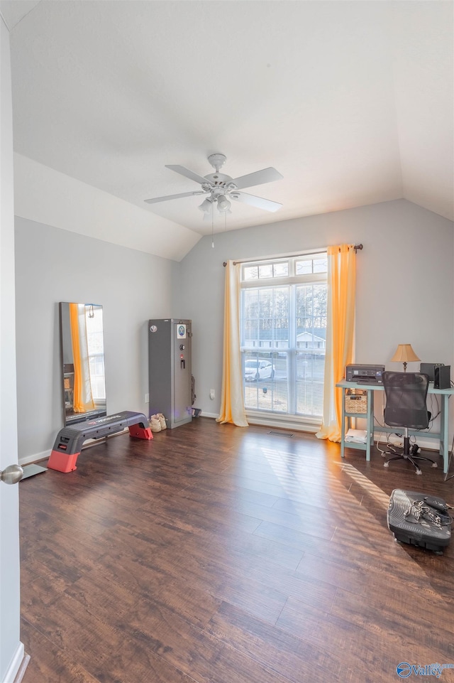 miscellaneous room with dark wood-type flooring, vaulted ceiling, and ceiling fan