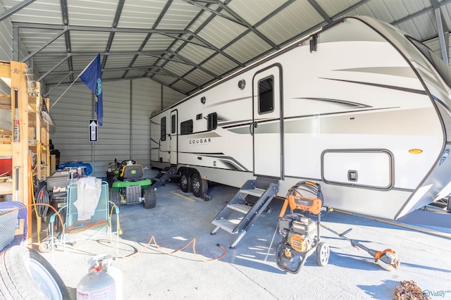 garage featuring a carport