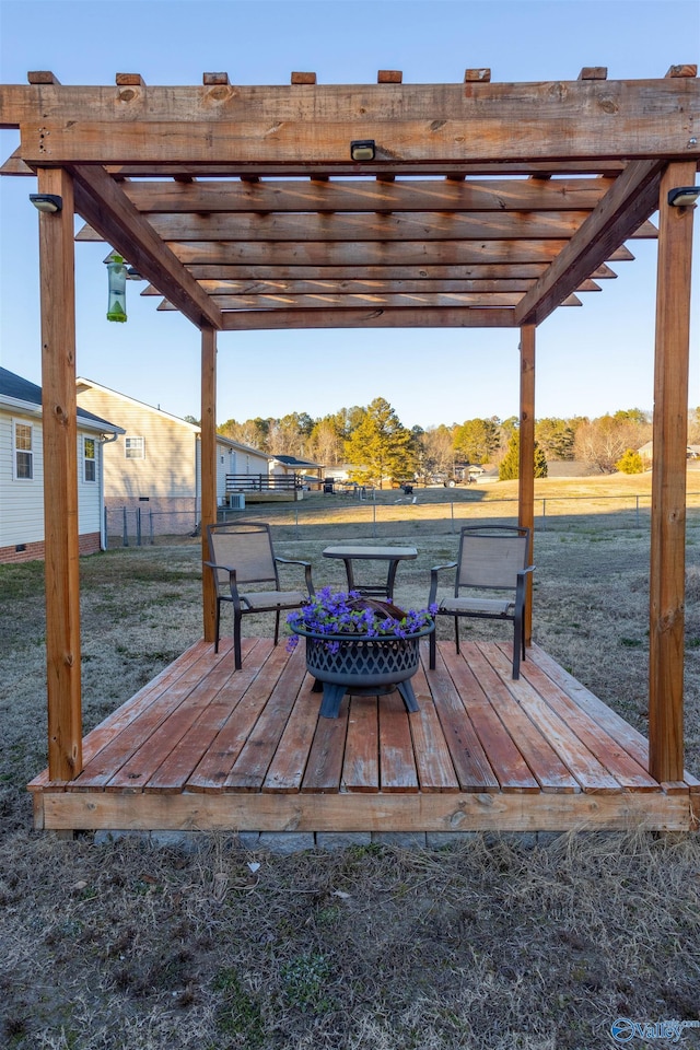 view of dock with a yard, a pergola, and a deck