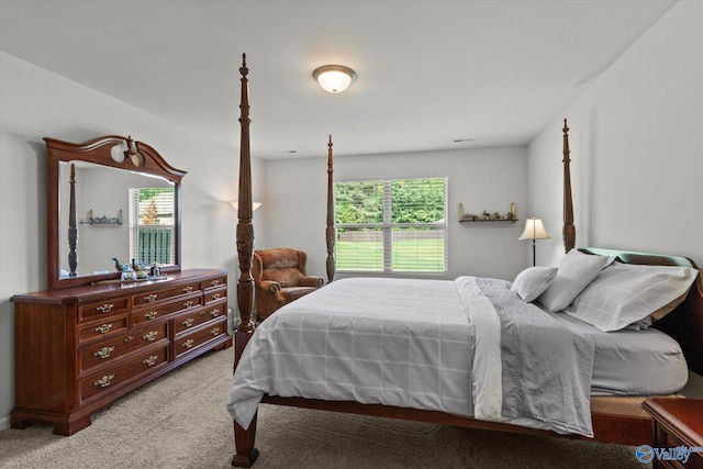bedroom with light carpet