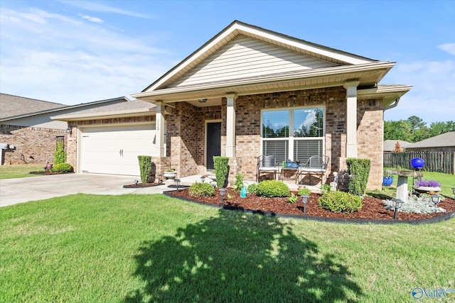 view of front facade with covered porch, brick siding, driveway, and an attached garage