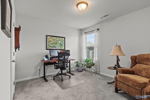 carpeted office with baseboards