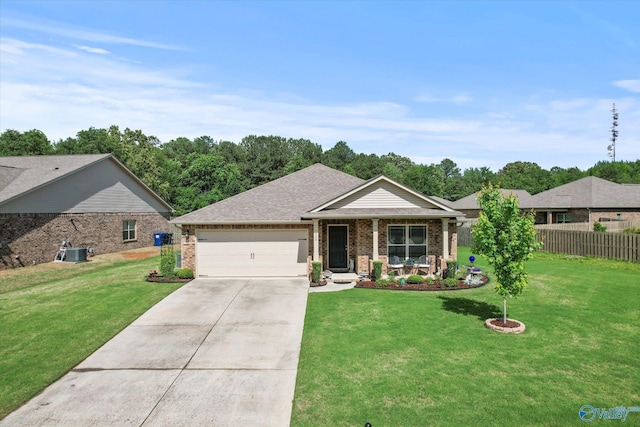 single story home featuring a garage, driveway, brick siding, central AC unit, and covered porch