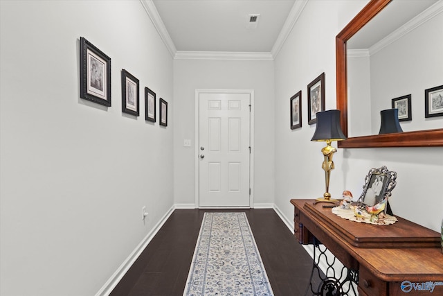 entryway with ornamental molding, dark wood-style flooring, and baseboards