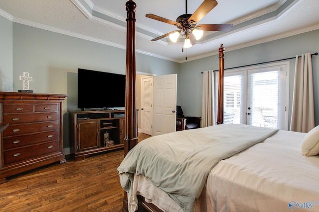 1405 Cedarhurst Ct, Decatur, AL 35603 - bedroom with a tray ceiling, access to outside, dark wood finished floors, crown molding, and ceiling fan