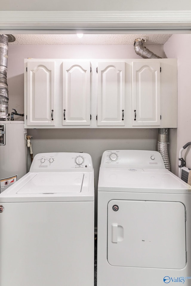 laundry area with cabinets and independent washer and dryer
