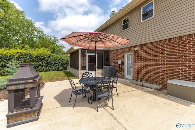 view of patio with central AC and outdoor dining area