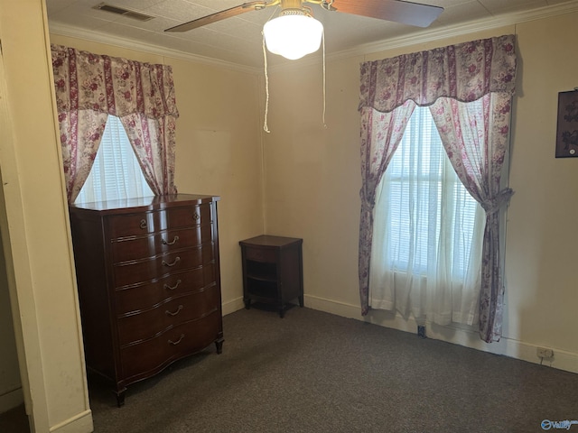 bedroom with a ceiling fan, baseboards, visible vents, crown molding, and carpet flooring