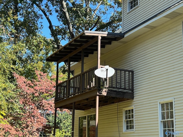 view of side of property featuring a deck