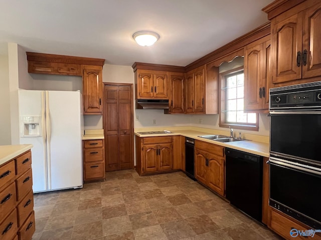 kitchen featuring sink and black appliances